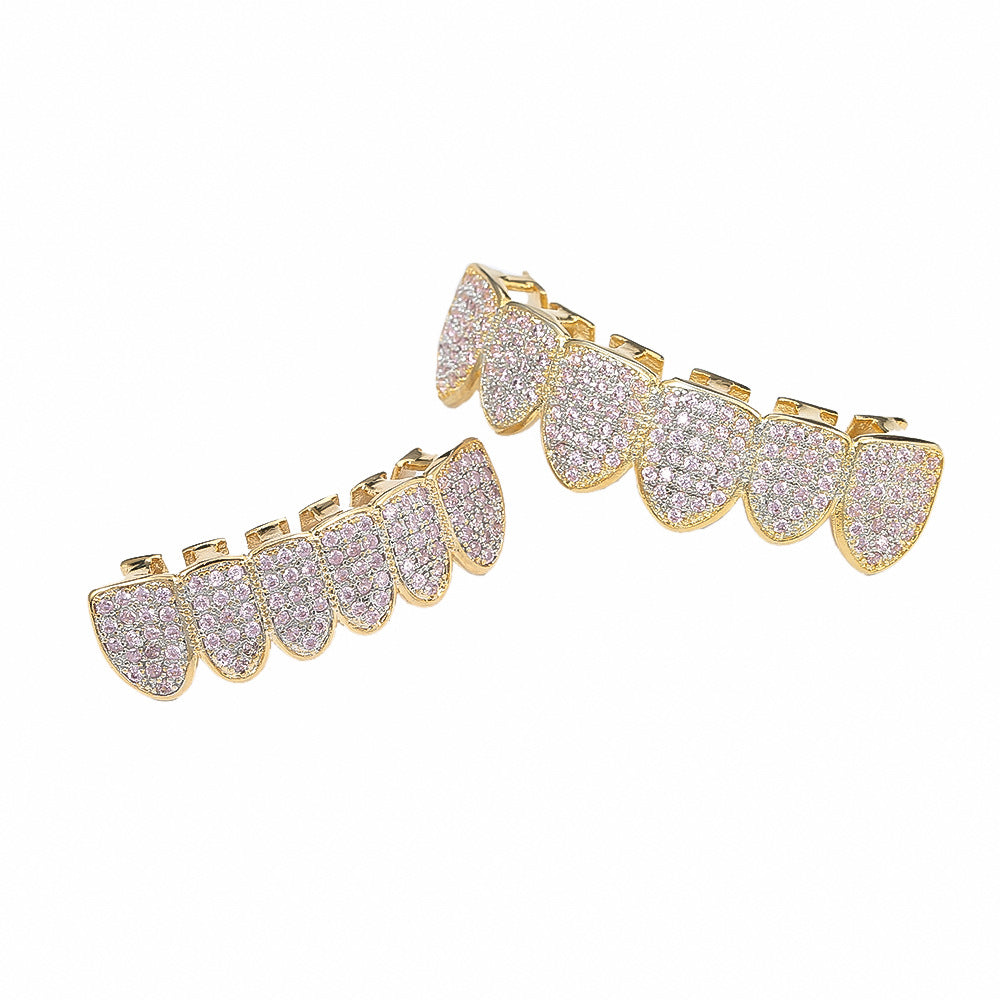 Micro inlaid gold teeth with pink zirconia braces