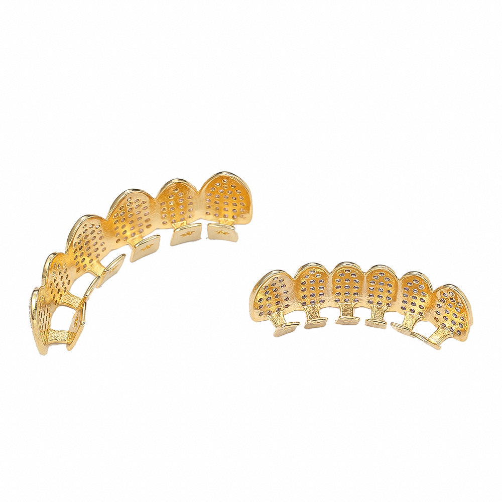 Micro inlaid gold teeth with pink zirconia braces